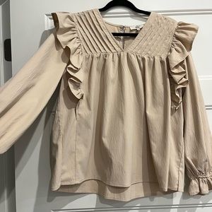 Womens cream long sleeve blouse.